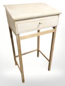 A pine clerk's writing slope on stand,