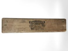 A Reichling Eberhard wooden cigar mould, width 55 cm.