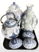 A group of contemporary Chinese blue and white porcelain items, including vase, lidded temple jar,