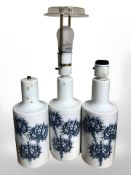 Three Royal Copenhagen blue and white porcelain lamp bases, height 23 cm excluding fittings.
