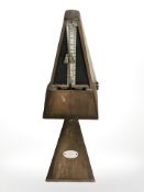 A French oak cased Maelzel metronome.