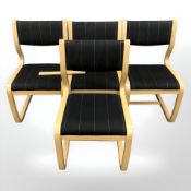 A set of four Danish bentwood armchairs in black striped fabric