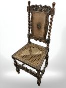 A 19th century Dutch heavily carved beech hall chair, with barley twist supports.