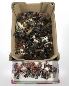 A collection of painted cast metal cavalry figures, Beefeaters, guardsmen, etc.