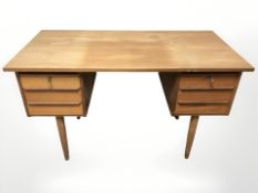 A 20th century Danish teak pine and MDF twin pedestal desk, 120 cm x 60 cm x 70 cm.