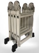 A fold-out aluminium step ladder.