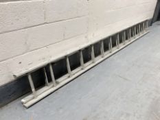 A two section aluminium ladder, length 353 cm.
