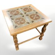 A Danish square lamp table inset with tiles,