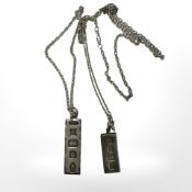 Two silver ingots on chains. CONDITION REPORT: 34.8g.