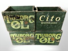 Three painted pine Tuborg bottle crates, width 45 cm, plus another similar.