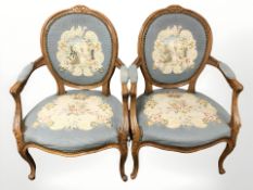 A pair of continental carved beech salon armchairs in tapestry fabric