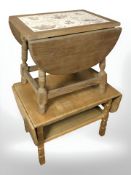 A Danish blond oak drop leaf occasional table and a similar table inset with tiles,