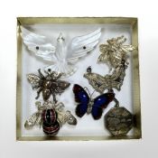 A group of brooches, insects, mother of pearl dove,