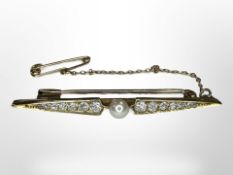 A yellow gold graduated diamond bar brooch, set with a seed pearl, 4g, length 50mm,