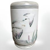 A Maling vase, decorated with ducks in flight, height 19.5 cm, numbered 110 to underside.