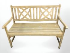 A teak garden bench, 120 cm x 60 cm x 91 cm.