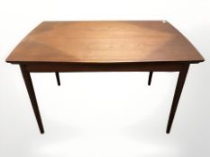A 20th century Danish teak pull-out extending dining table, 127 cm x 85 cm x 75 cm.