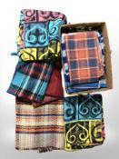 A quantity of woolen blankets and throws.