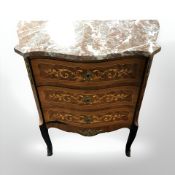 A 20th century continental kingwood veneered serpentine three drawer chest, with rouge marble top,