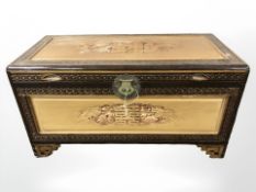 An oriental camphor wood chest,