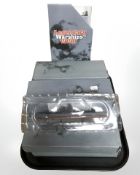 Ten Atlas Editions scale model battleships and accompanying leaflets.