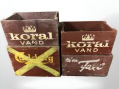 Four painted pine bottle crates including Carlsberg, width 44 cm.
