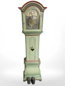 A 20th century continental painted longcase clock with pendulum and weights,
