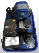 A Fujifilm Finepix S5600 digital camera, Pentax camera, Olympus camera,