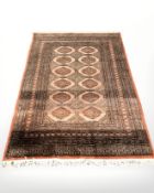 A Lahore Bokhara rug, Pakistan, 200 cm x 132 cm.