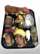 A group of Bossons wall plaques, Beswick figure of a sheep and two further cow figures.