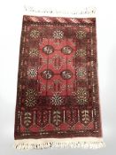 A Turkoman rug, Afghanistan, 122 cm x 70 cm.