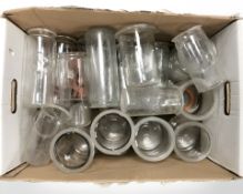 A quantity of glass storage jars.