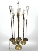 Six continental brass floor lamps.