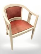 A painted armchair in studded dralon fabric,