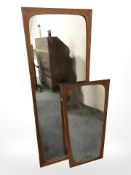 Two 1970s teak framed mirrors, largest 116 cm x 42 cm.