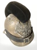 A reproduction pickelhaube helmet.