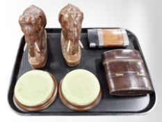 A pair of carved wooden elephants,