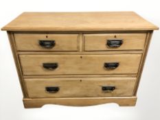 An Edwardian satin walnut four drawer chest, 107 cm x 47 cm x 78 cm.