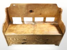 A small pine box settle,