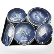 Twenty three Bing & Grondahl blue and white porcelain collectors plates.