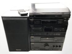 A Technics automatic turntable system SL-J110R, stereo synthesizer tuner ST-X302L,