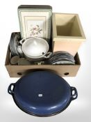 A Le Creuset enameled metal twin handled cooking pot, with cover, width 50 cm,