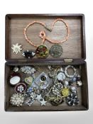 A mahogany box of costume jewellery, dress ring,