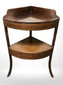 A George III-style inlaid mahogany corner washstand, height 92 cm.