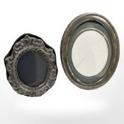 Two silver photograph frames, largest 126 mm x 165 mm.