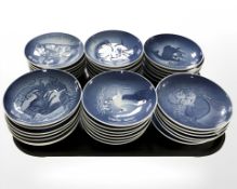 Thirty nine Bing & Grondahl blue and white porcelain collectors plates.