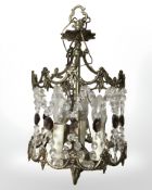 A 19th century style gilt brass pendant light fitting with crystal swags, height 44 cm.