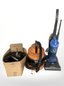 A Vax vacuum, a Hoover vacuum and various accessories.