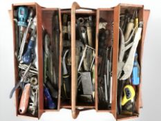 A metal concertina tool box and contents