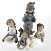 Four Nao figures of children, tallest 19.5 cm.